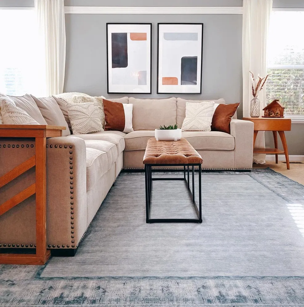 using an oversized rug in a small space