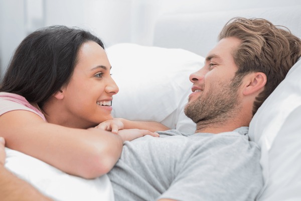 couple talking in bed