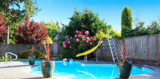 Fenced backyard with small beautiful swimming pool